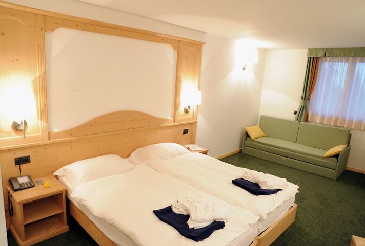 Alpine Mugon Hotel
